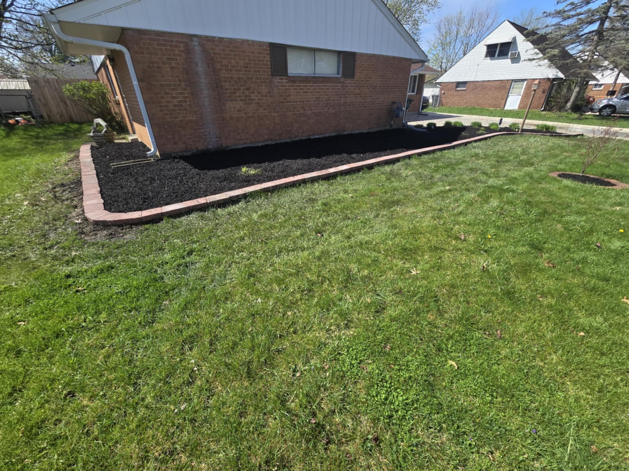 Complete brick border foundation bed installation